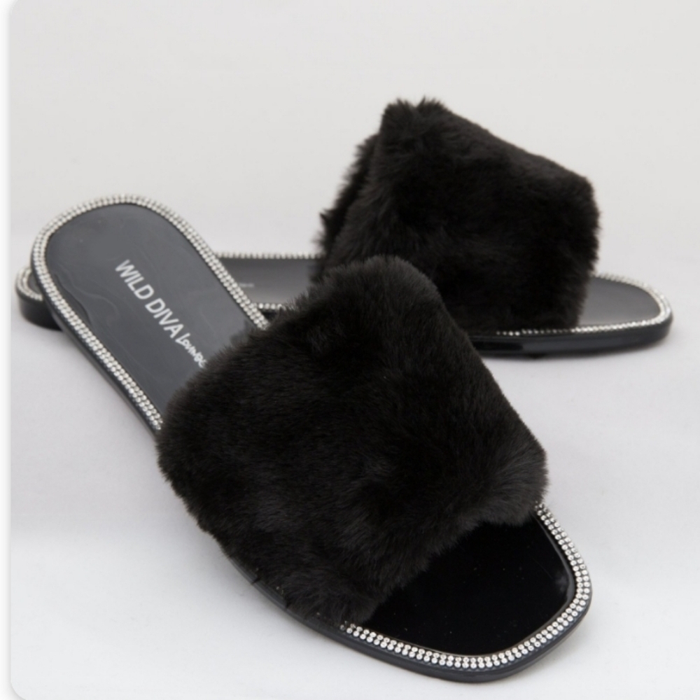 Black, plastic flip flop with fur upper